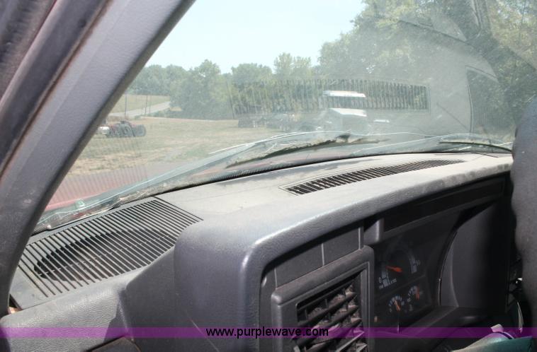 image for item C2738 1996 GMC TopKick roll off truck