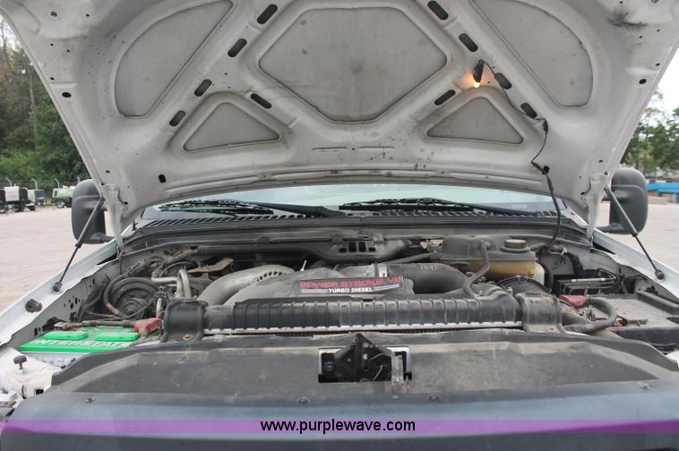 image for item C2756 2006 Ford F450 XL Super Duty flatbed pickup truck