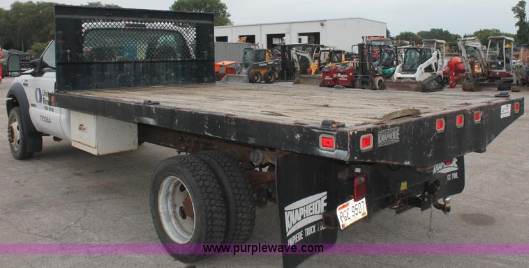 image for item C2756 2006 Ford F450 XL Super Duty flatbed pickup truck