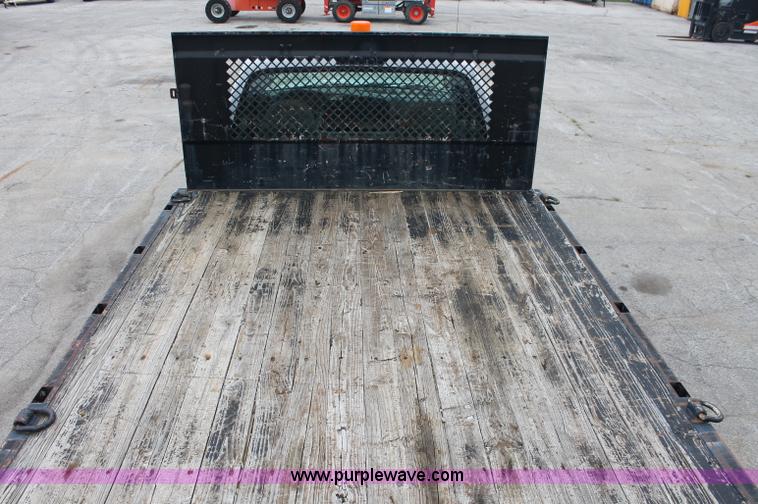 image for item C2756 2006 Ford F450 XL Super Duty flatbed pickup truck