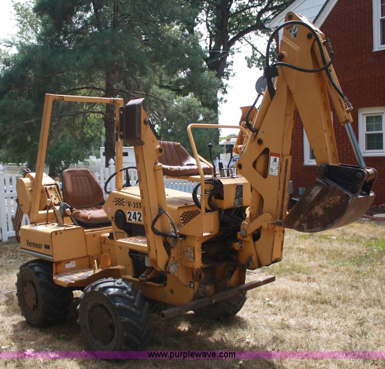 image for item C5754 Vermeer V3550A vibratory plow with backhoe