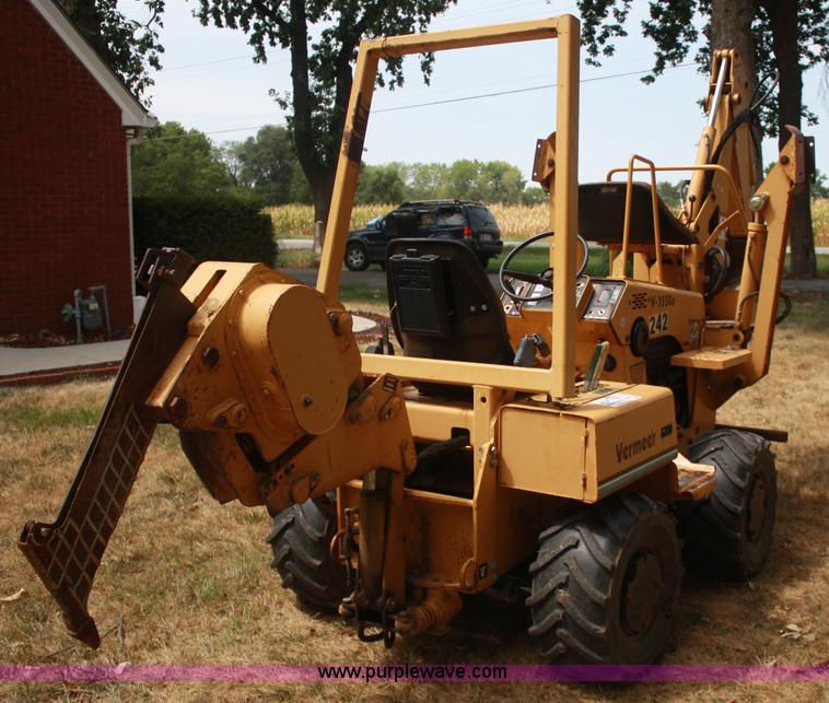 image for item C5754 Vermeer V3550A vibratory plow with backhoe