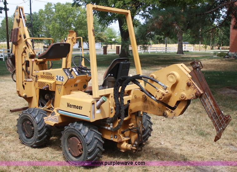 image for item C5754 Vermeer V3550A vibratory plow with backhoe
