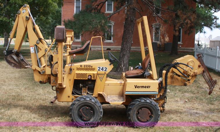 image for item C5754 Vermeer V3550A vibratory plow with backhoe