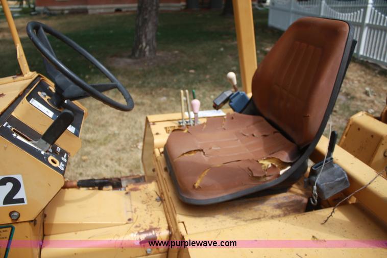 image for item C5754 Vermeer V3550A vibratory plow with backhoe