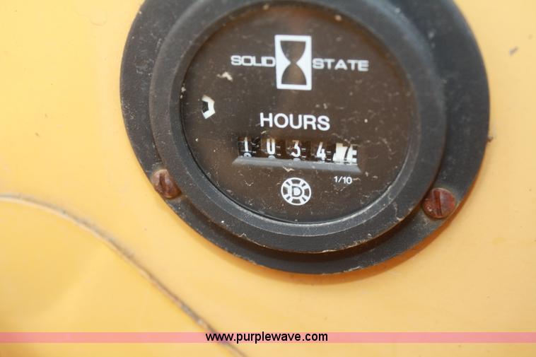 image for item C5754 Vermeer V3550A vibratory plow with backhoe