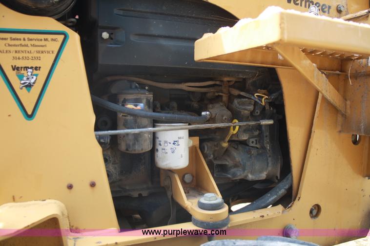 image for item C5754 Vermeer V3550A vibratory plow with backhoe