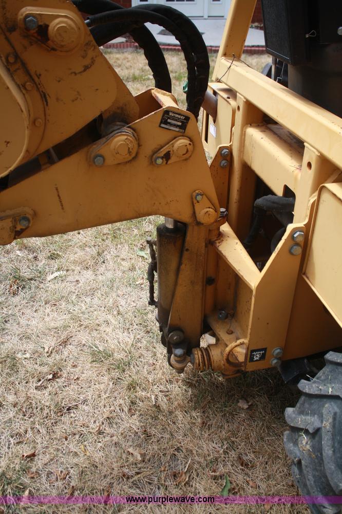 image for item C5754 Vermeer V3550A vibratory plow with backhoe