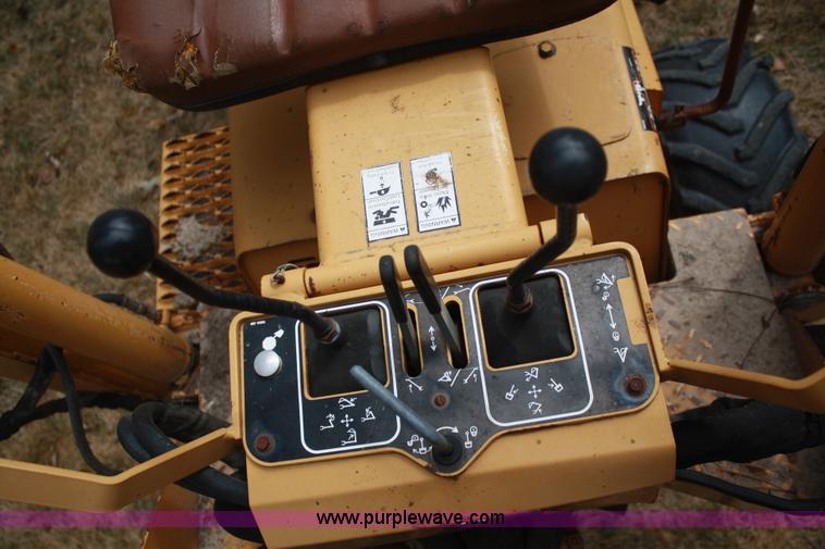 image for item C5754 Vermeer V3550A vibratory plow with backhoe