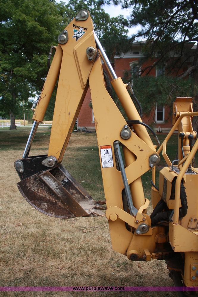 image for item C5754 Vermeer V3550A vibratory plow with backhoe