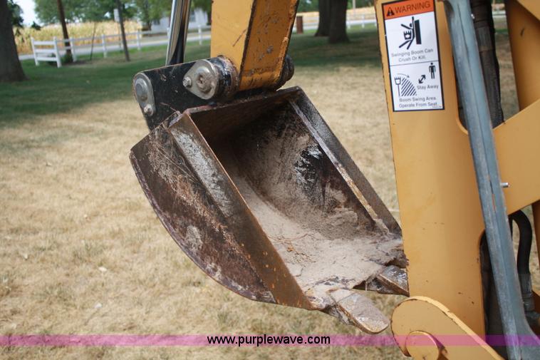 image for item C5754 Vermeer V3550A vibratory plow with backhoe