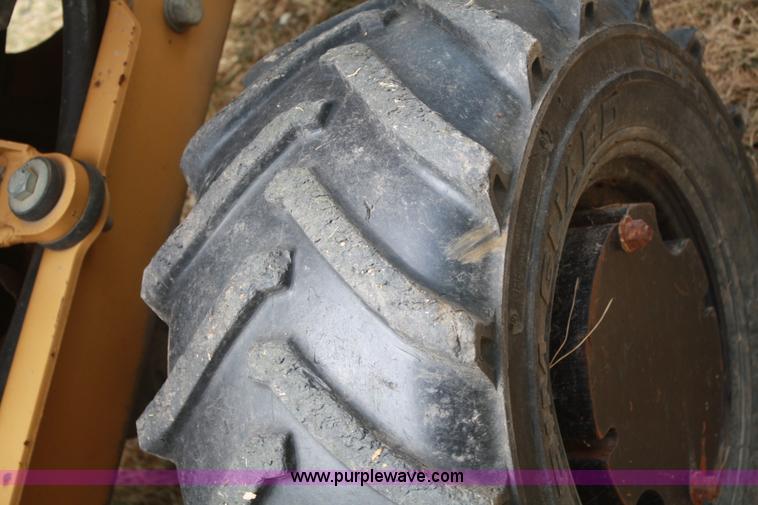 image for item C5754 Vermeer V3550A vibratory plow with backhoe