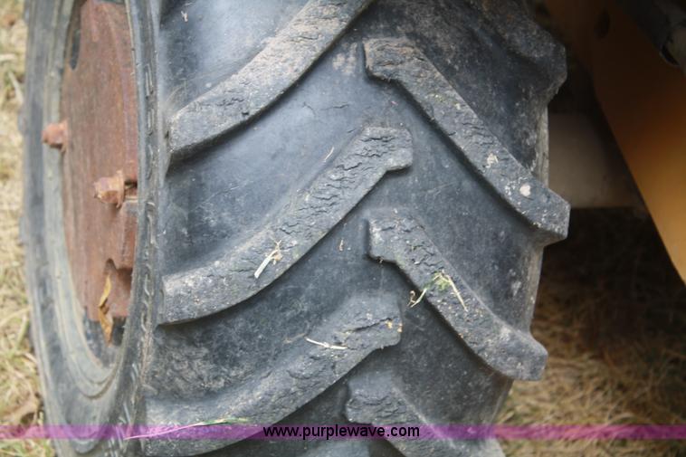 image for item C5754 Vermeer V3550A vibratory plow with backhoe