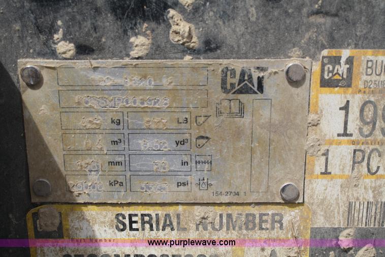 image for item K9817 Caterpillar 4-in-1 skid steer bucket