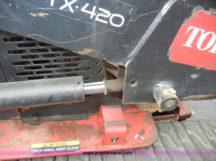 image for item M9711 Toro TX-420 Dingo walk behind loader