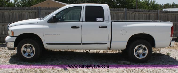 image for item B6664 2002 Dodge Ram quad cab pickup truck