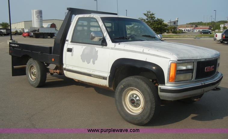 image for item D4462 1992 GMC Sierra SLE 2500 HD flatbed pickup truck