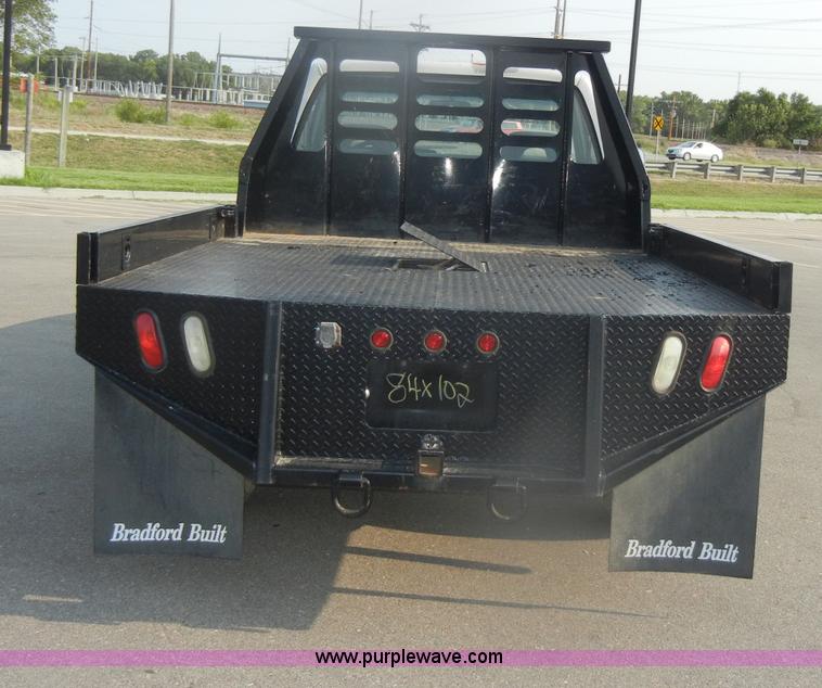 image for item D4462 1992 GMC Sierra SLE 2500 HD flatbed pickup truck