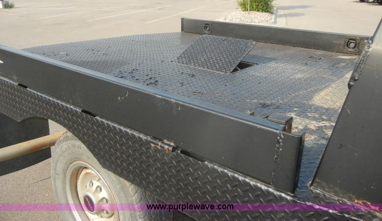 image for item D4462 1992 GMC Sierra SLE 2500 HD flatbed pickup truck