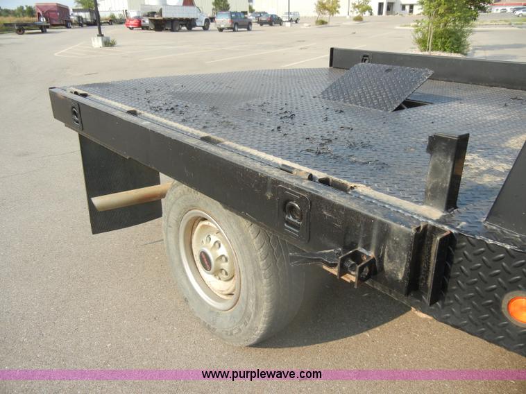 image for item D4462 1992 GMC Sierra SLE 2500 HD flatbed pickup truck