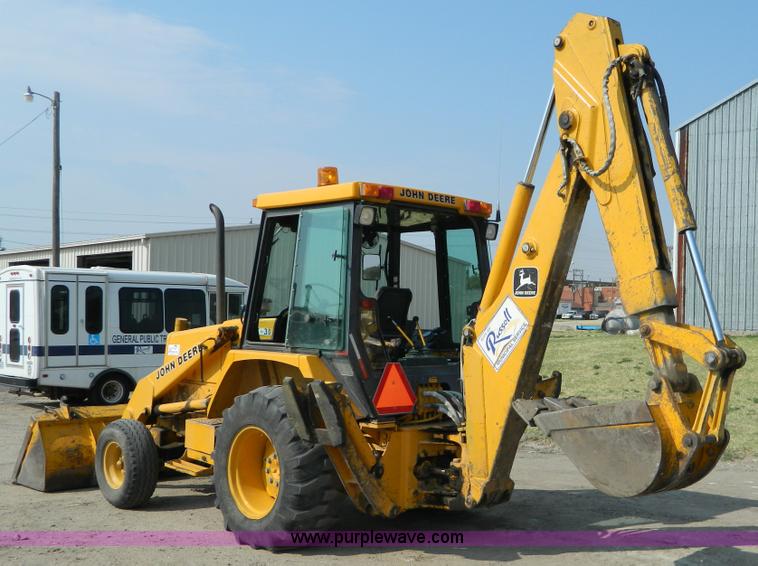 image for item D3859 1990 John Deere 310C backhoe