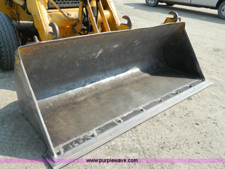 image for item D3859 1990 John Deere 310C backhoe