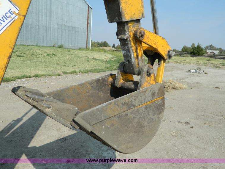 image for item D3859 1990 John Deere 310C backhoe