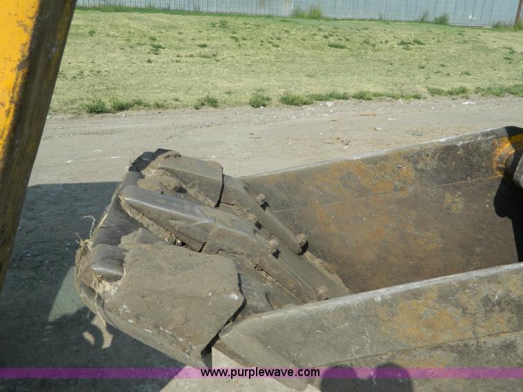 image for item D3859 1990 John Deere 310C backhoe