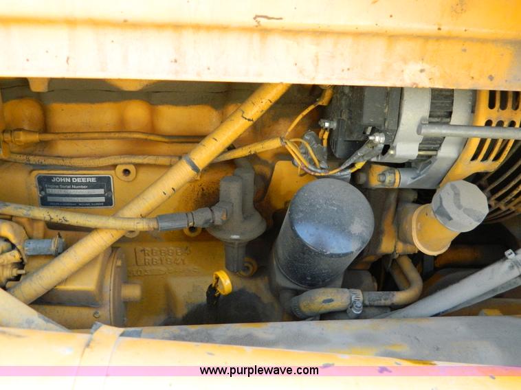 image for item D3859 1990 John Deere 310C backhoe