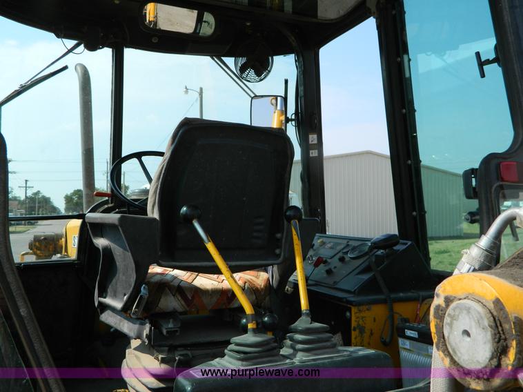 image for item D3859 1990 John Deere 310C backhoe