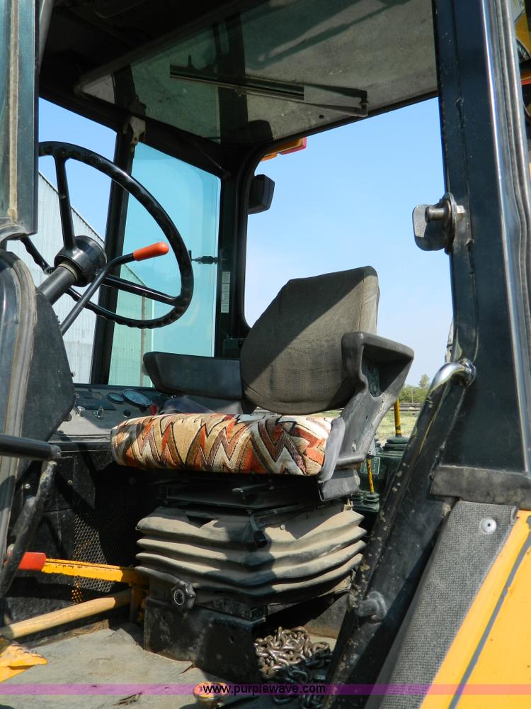 image for item D3859 1990 John Deere 310C backhoe