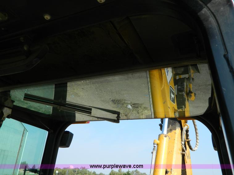 image for item D3859 1990 John Deere 310C backhoe