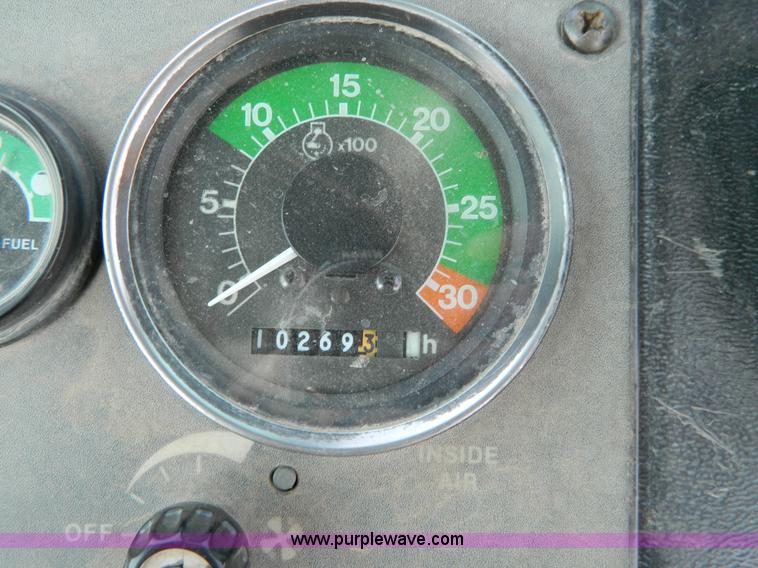 image for item D3859 1990 John Deere 310C backhoe