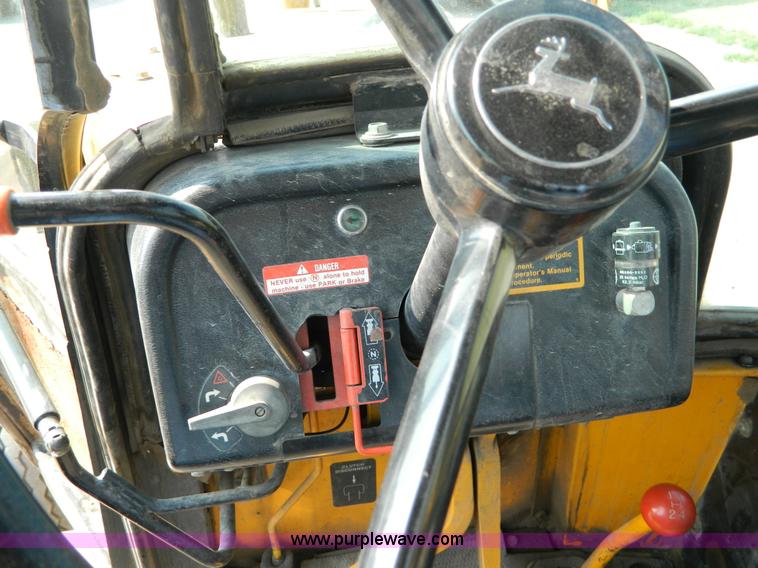 image for item D3859 1990 John Deere 310C backhoe