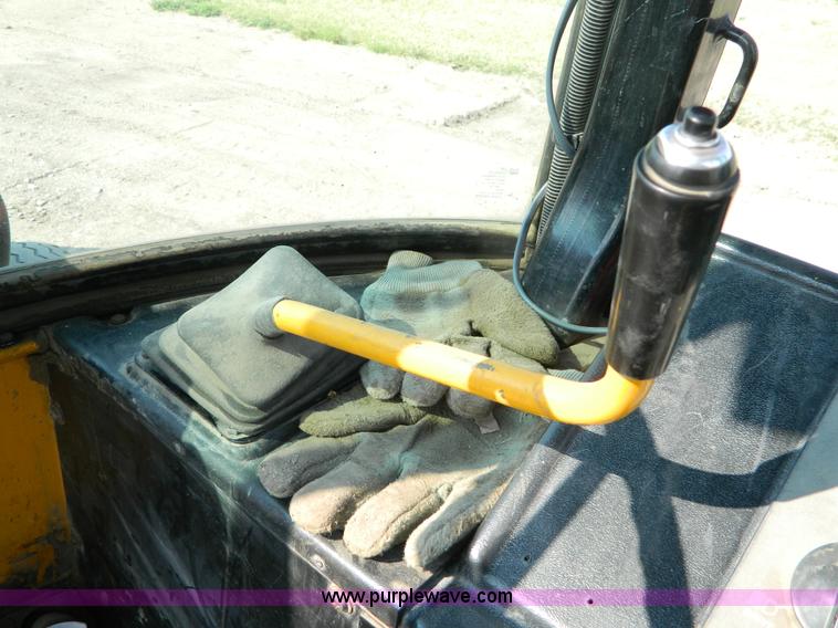 image for item D3859 1990 John Deere 310C backhoe