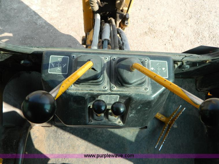 image for item D3859 1990 John Deere 310C backhoe