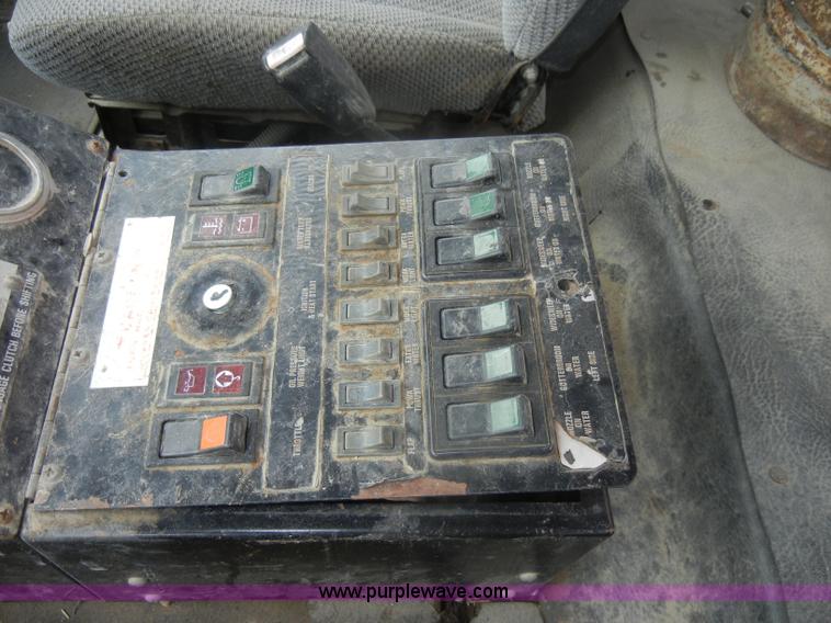 image for item D4398 1992 GMC Johnston 600 street sweeper