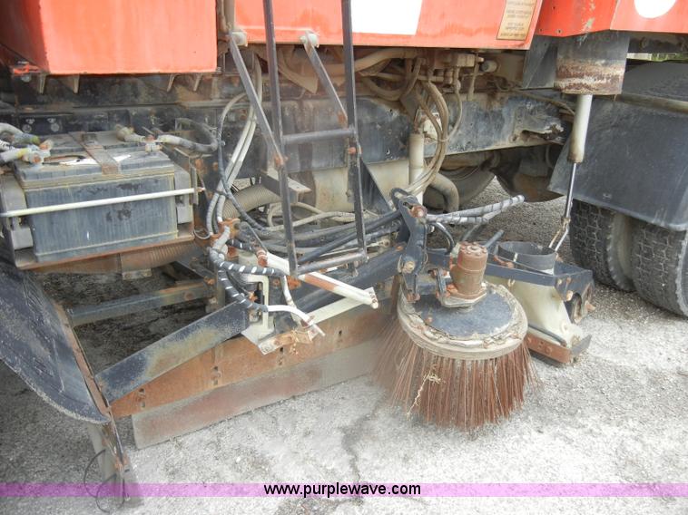 image for item D4398 1992 GMC Johnston 600 street sweeper