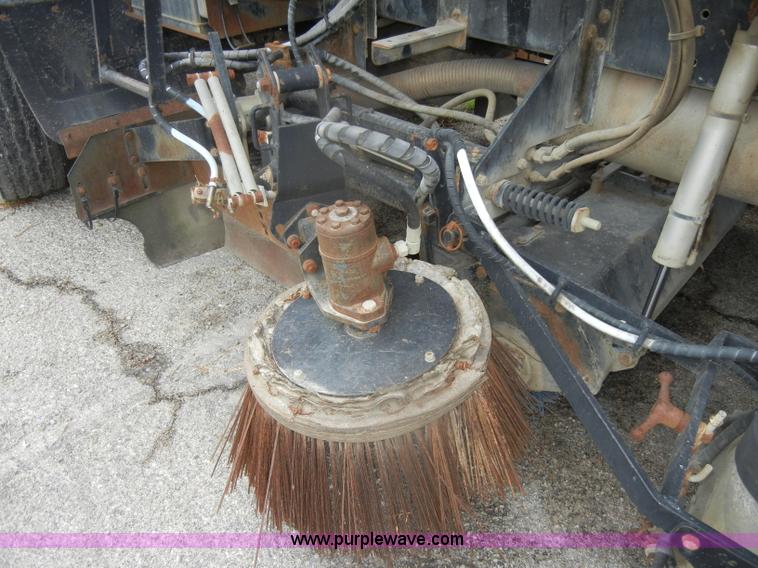 image for item D4398 1992 GMC Johnston 600 street sweeper