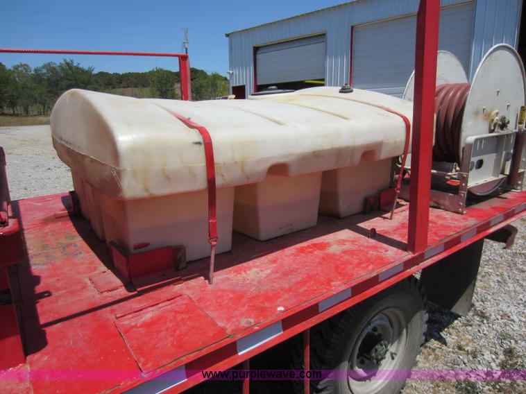 image for item D5605 1977 Dodge W200 flatbed pickup truck