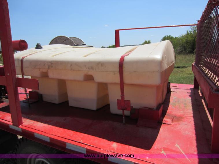 image for item D5605 1977 Dodge W200 flatbed pickup truck