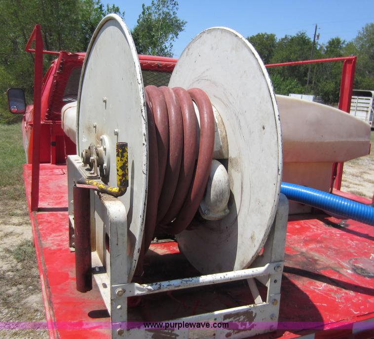 image for item D5605 1977 Dodge W200 flatbed pickup truck