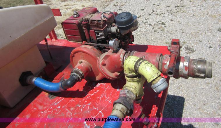 image for item D5605 1977 Dodge W200 flatbed pickup truck