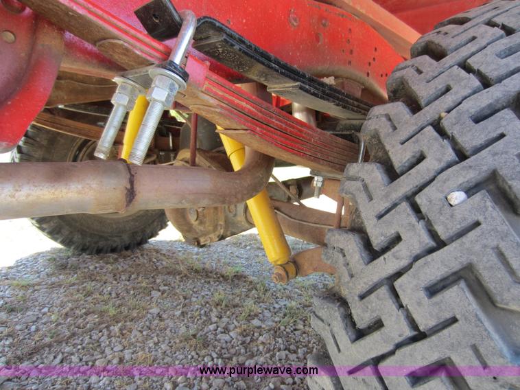 image for item D5605 1977 Dodge W200 flatbed pickup truck