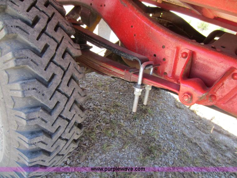 image for item D5605 1977 Dodge W200 flatbed pickup truck