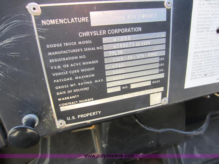 image for item D5605 1977 Dodge W200 flatbed pickup truck