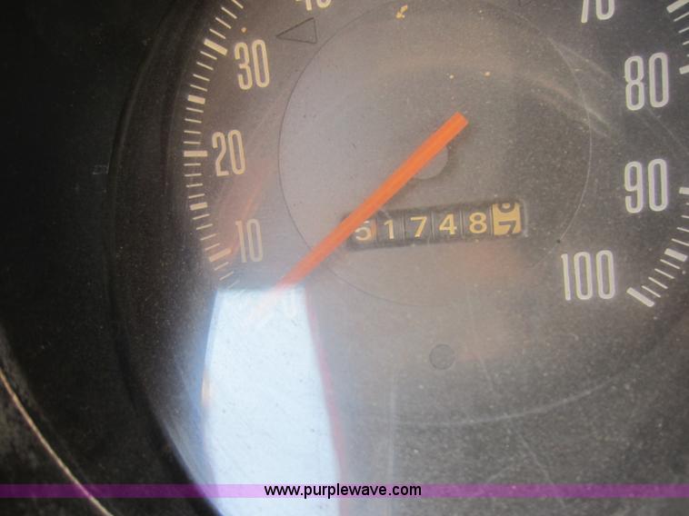 image for item D5605 1977 Dodge W200 flatbed pickup truck