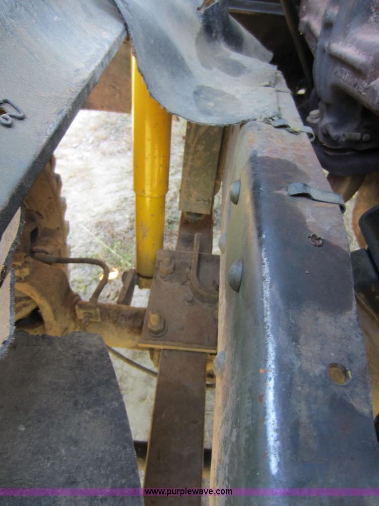 image for item D5605 1977 Dodge W200 flatbed pickup truck