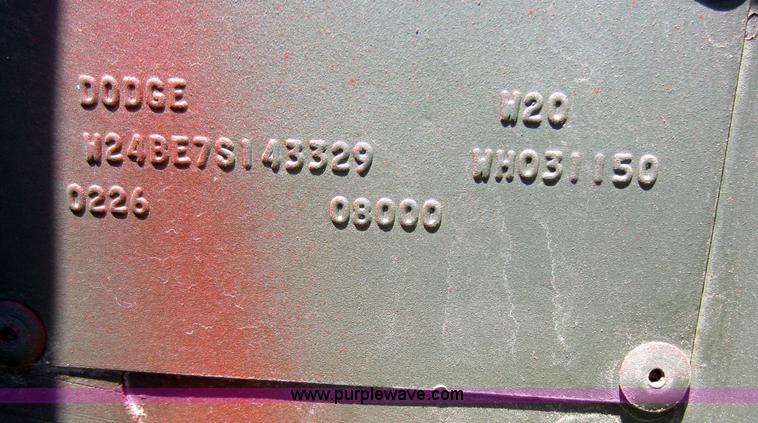 image for item D5605 1977 Dodge W200 flatbed pickup truck