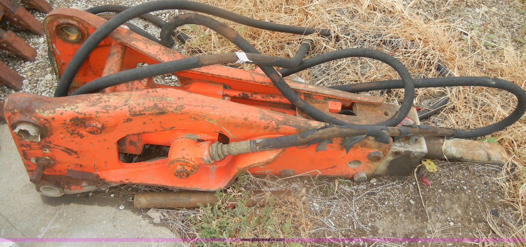 Backhoe breaker attachment in Burlingame, KS Item M9722 sold Purple